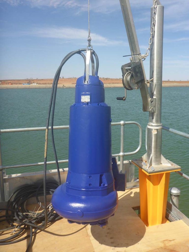 Submersible pump for bulk water storage dam installed by divers